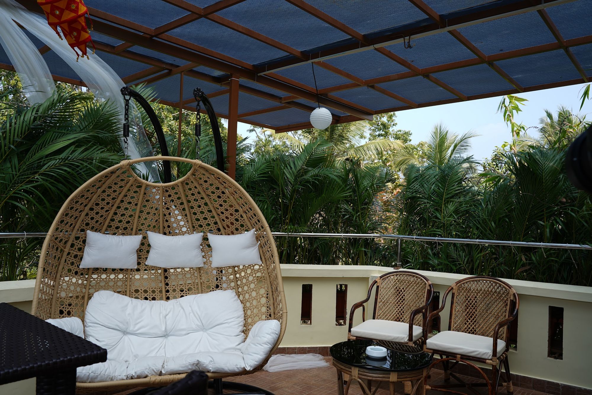 The swing chair terrace at Cove